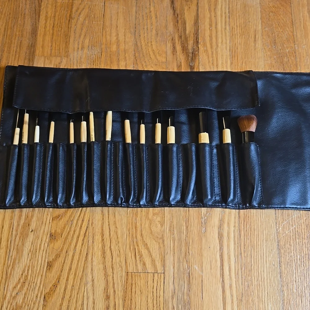Bobbi Brown black brush roll with 15 brushes